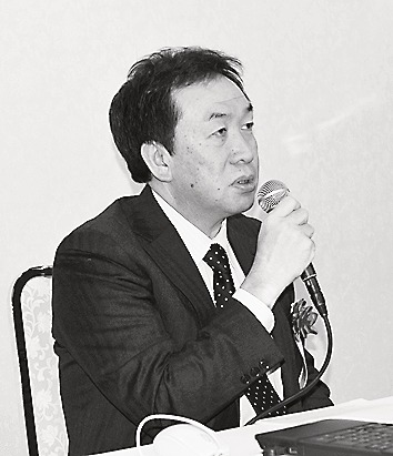講演する高橋社長