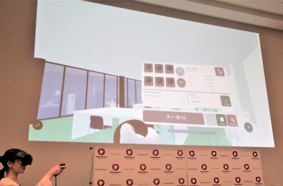 ヘッドマウントディスプレイを使った例。建築予定の建物の素材を実寸大で確認できる